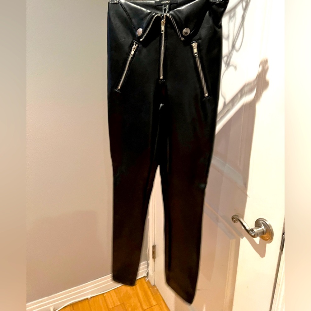 Leather leggings size xs, with silver zipper and button detail